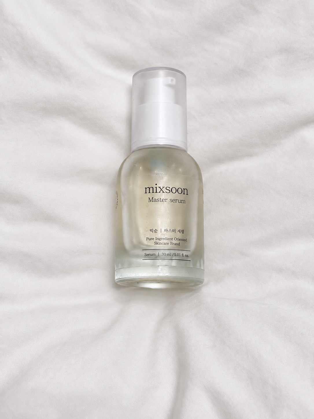 mixsoon Master Serum on white fabric